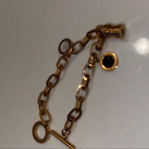 Elegant Gold Bracelet with Black Accents